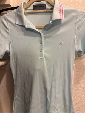 G/FORE Pale Blue Women’s Golf polo with Pink Collar Accents